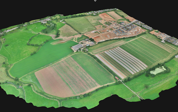 G4 Angled View Of Site Aerial Photograph Field Vegetation Buildings